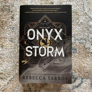 Onyx Storm by - Black and Gray Cover